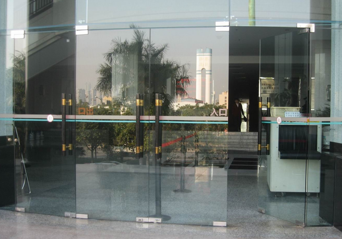 無(wú)框玻璃地彈門(mén)